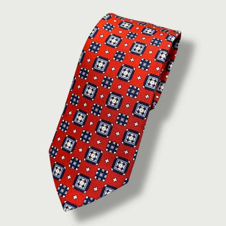 Corbata de seda roja con estampado geométrico de medallones – Fabricada en Italia