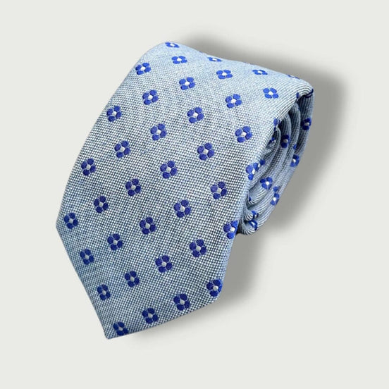 Corbata de seda gris claro con estampado floral azul marino – Fabricada en Italia