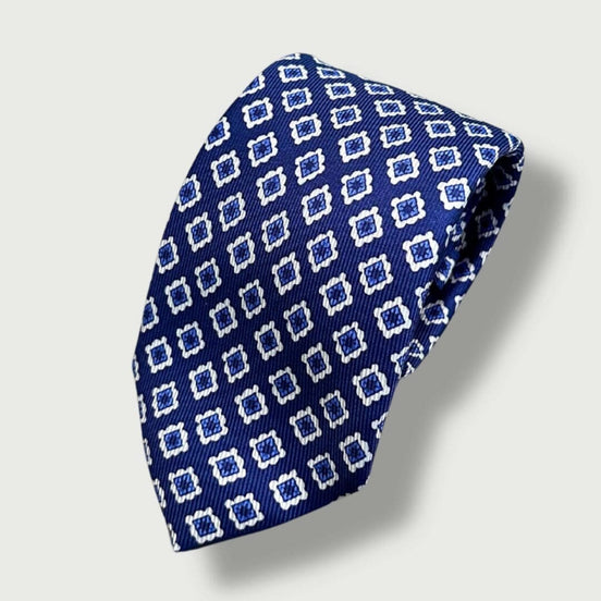 Corbata de seda azul marino con estampado floral geométrico – Fabricada en Italia