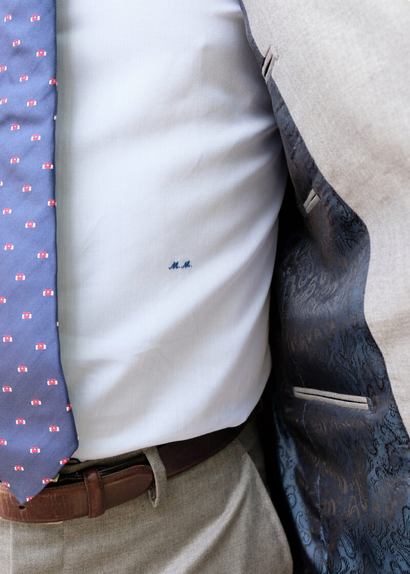 A close up of a tie and shirt