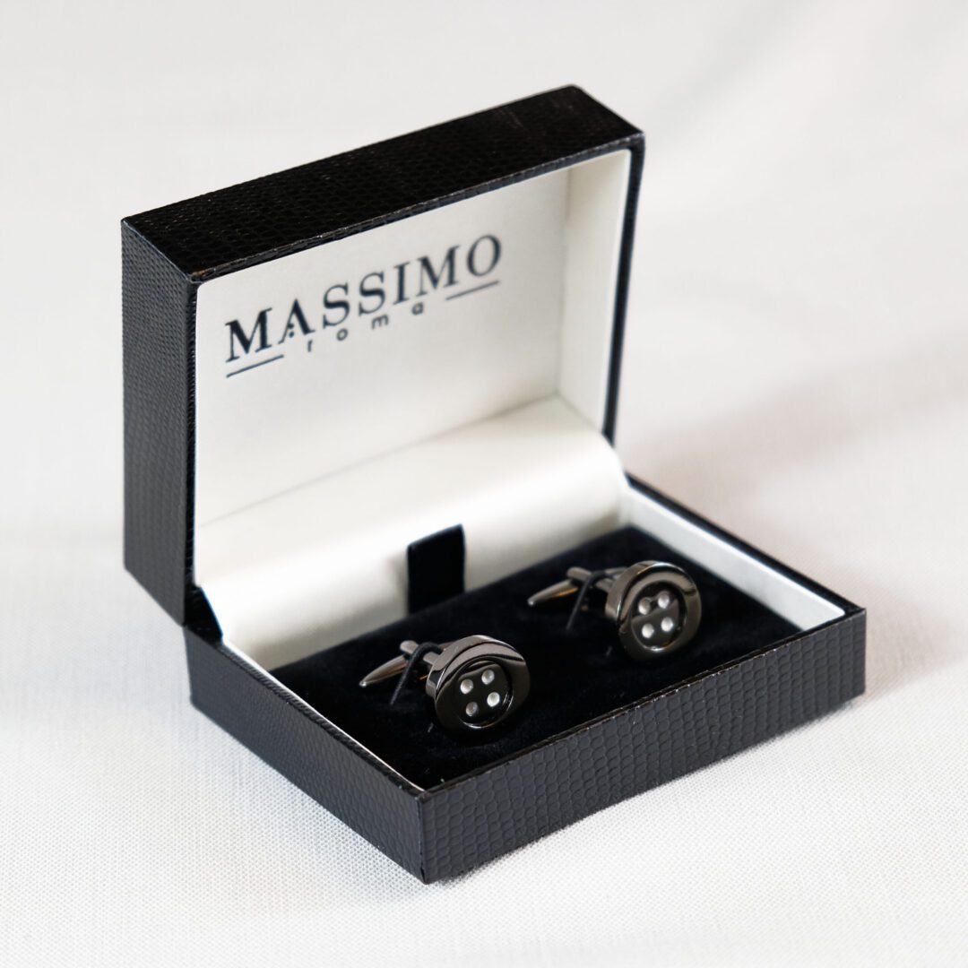 A box with two cufflinks in it