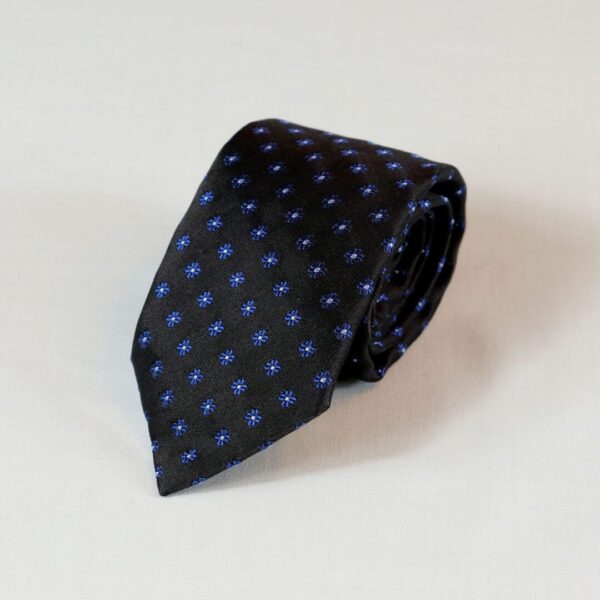 A black tie with blue squares on it