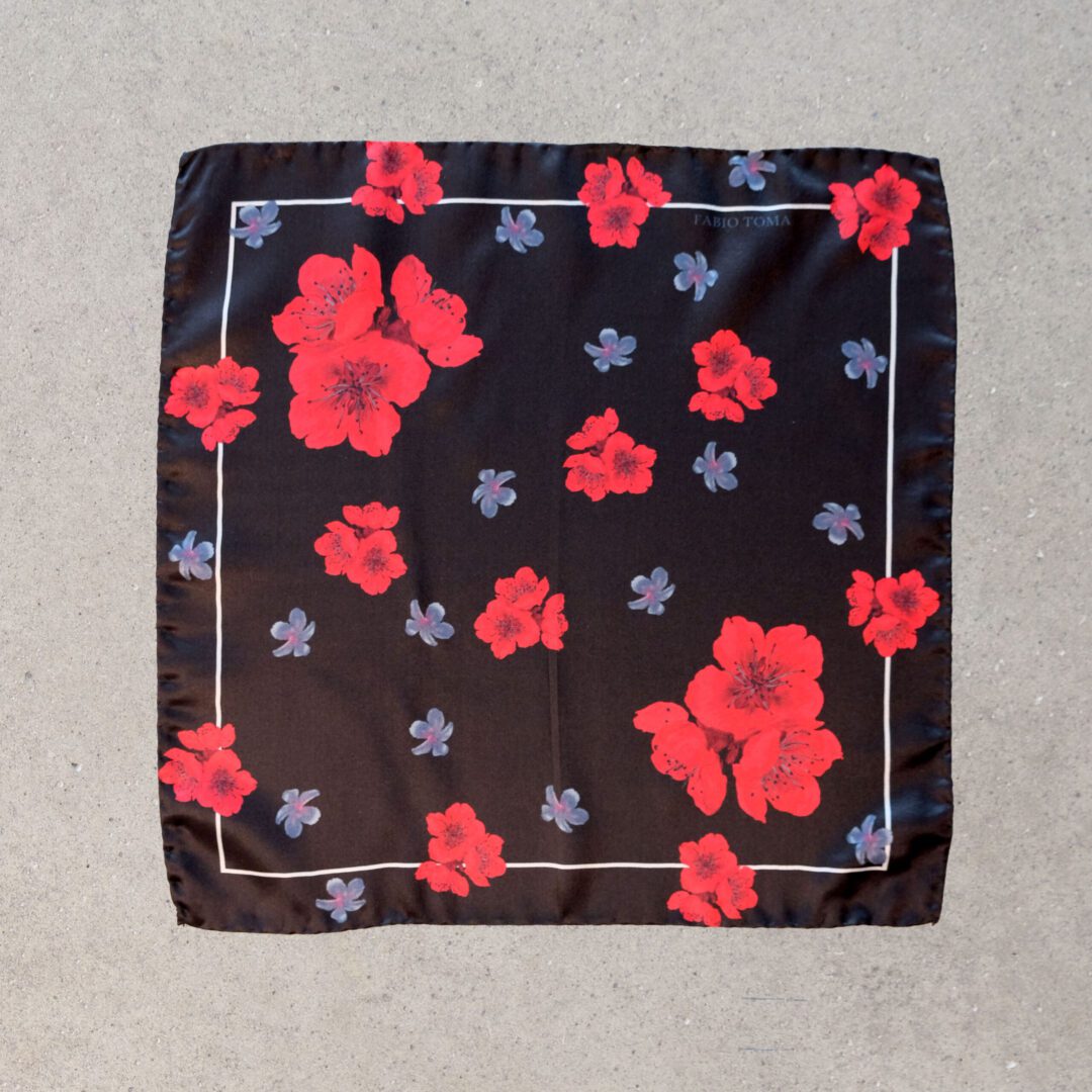 A black and red floral print square scarf.