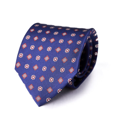 A blue tie with red and white flowers on it