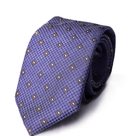 A purple tie with brown squares on it