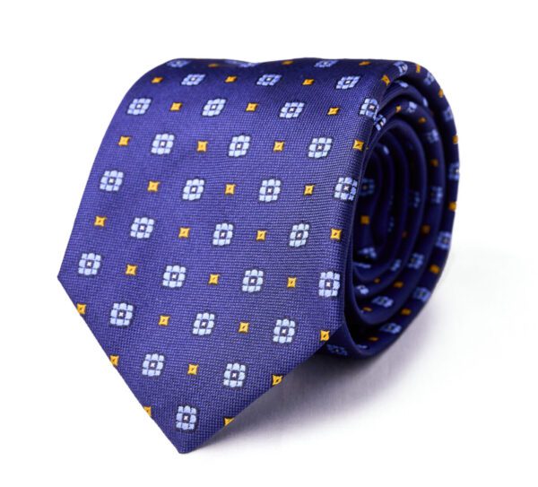 A blue tie with yellow and white squares on it