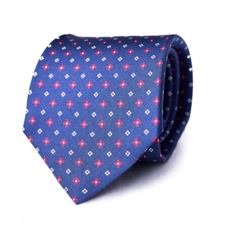 A blue tie with red and white squares on it