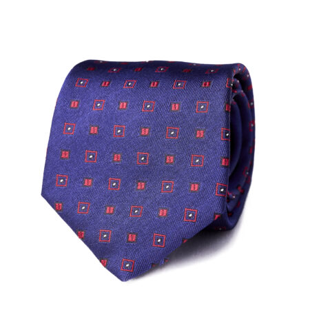 A blue tie with red squares and dots on it