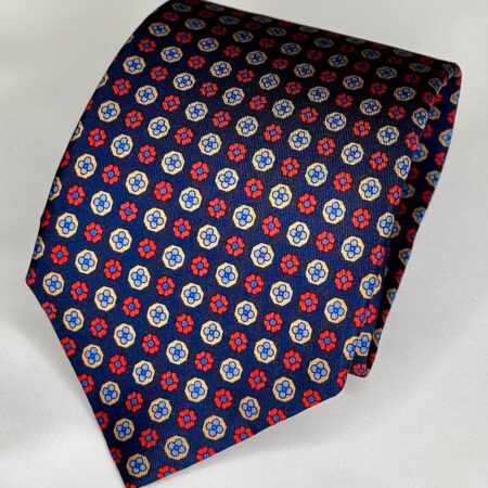 A red, white and blue tie with stars on it.