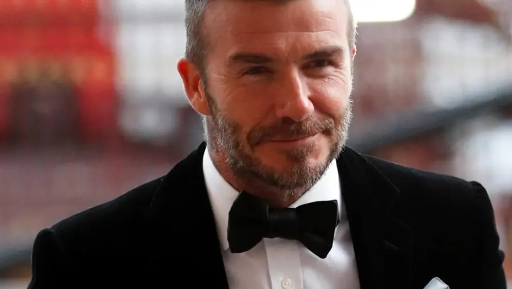 A man in a tuxedo and bow tie.